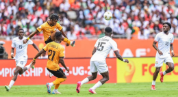 Harambee Stars team playing at Kasarani Stadium